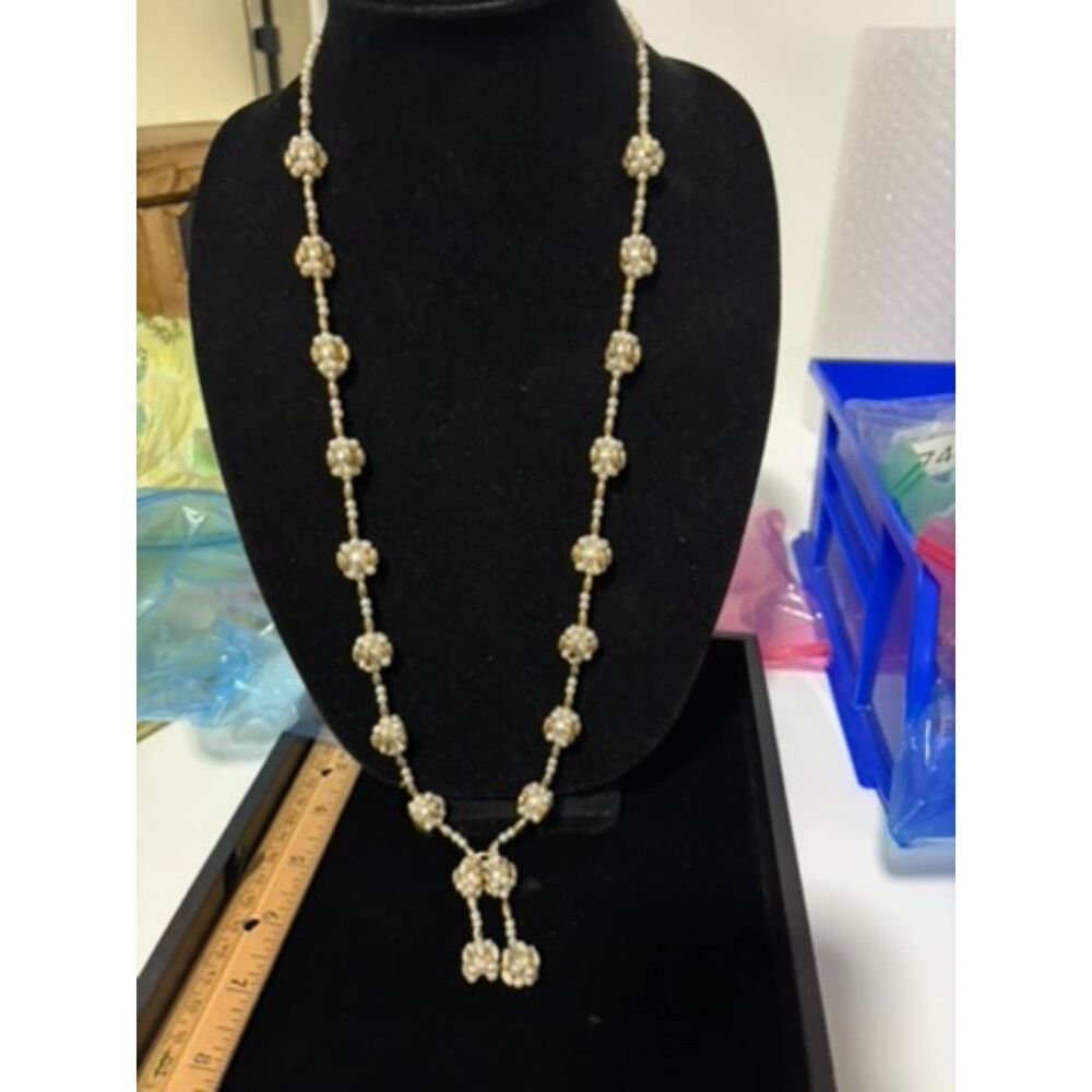 vtg white and gold beaded station necklace with floral motif
